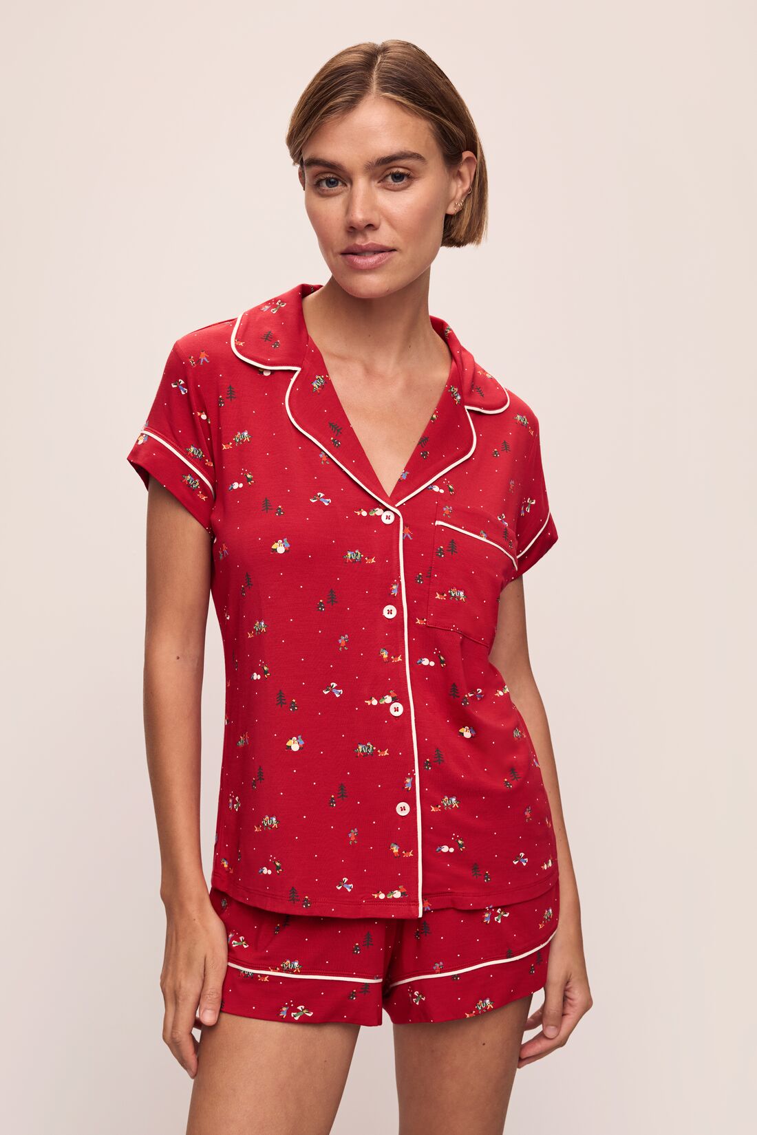 Model wears the Gisele Printed TENCELâ„¢ Modal Shortie Short PJ Set in Winter Wonderland Haute Red/Ivory.