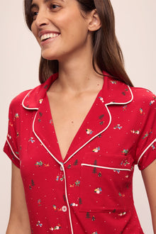 Model wears the Gisele Printed TENCELâ„¢ Modal Shortie Short PJ Set in Winter Wonderland Haute Red/Ivory.