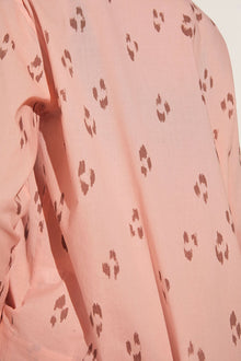 Model wears Organic Sandwashed Cotton Printed Long PJ Set in Animal Spot Rose Cloud.