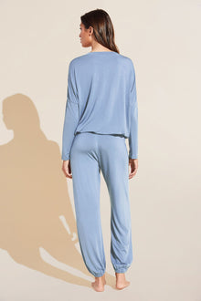 Model wears Gisele TENCEL Modal Slouchy PJ Set in wedgewood blue/ivory.