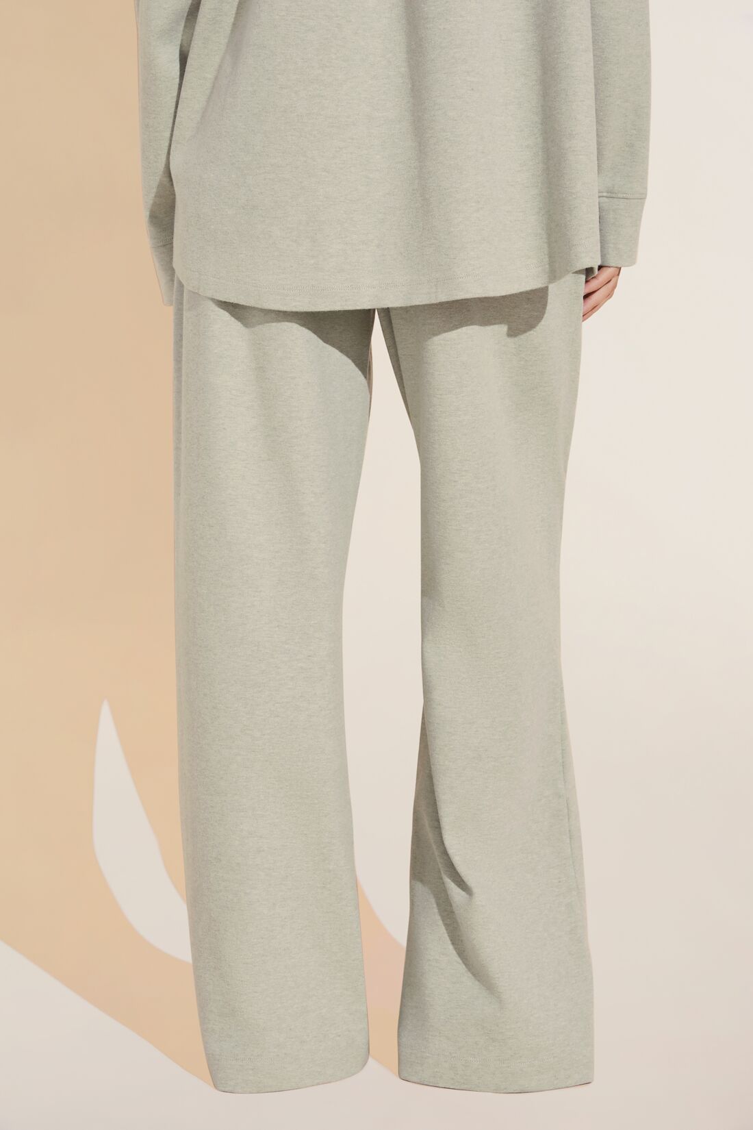 Model wears Luxe Sweats Wide Leg Pant in botanical zen green.