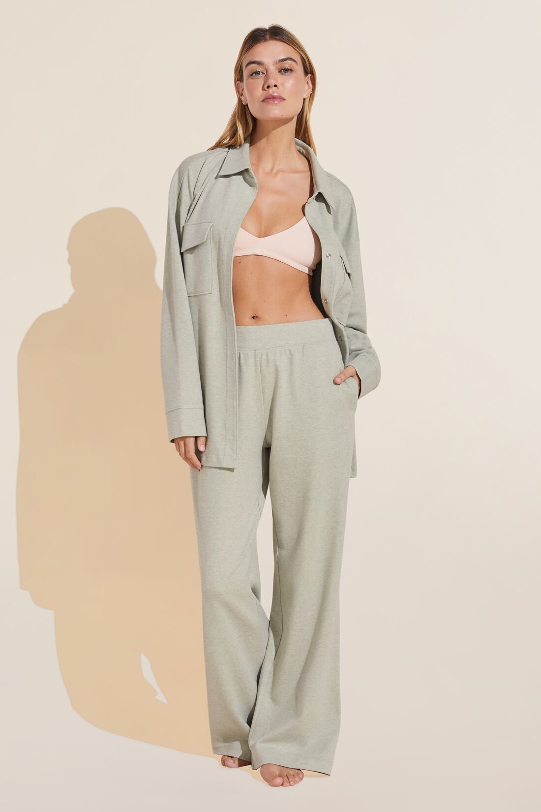 Model wears Luxe Sweats Wide Leg Pant in botanical zen green.