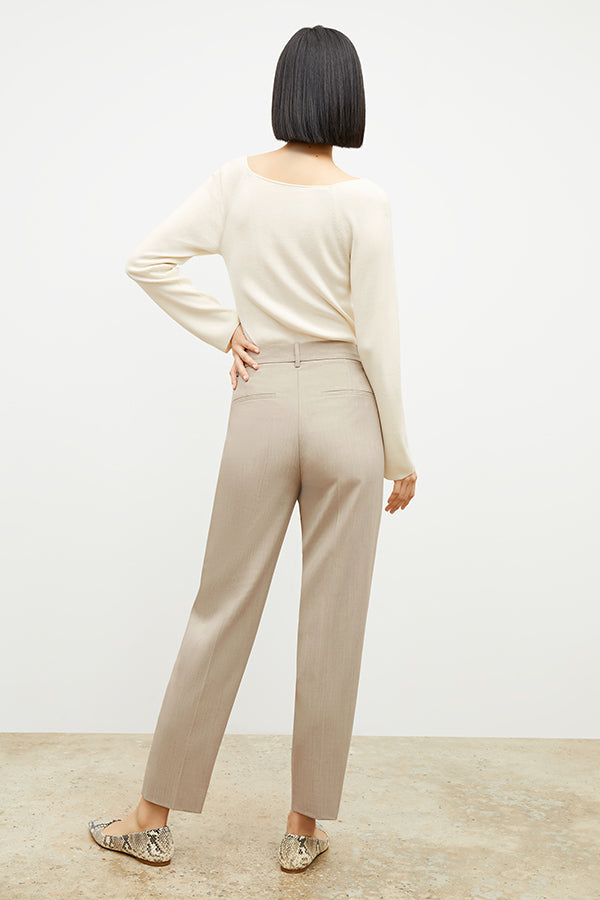 Back image of a woman wearing the Joya Top in Cream | Exclude