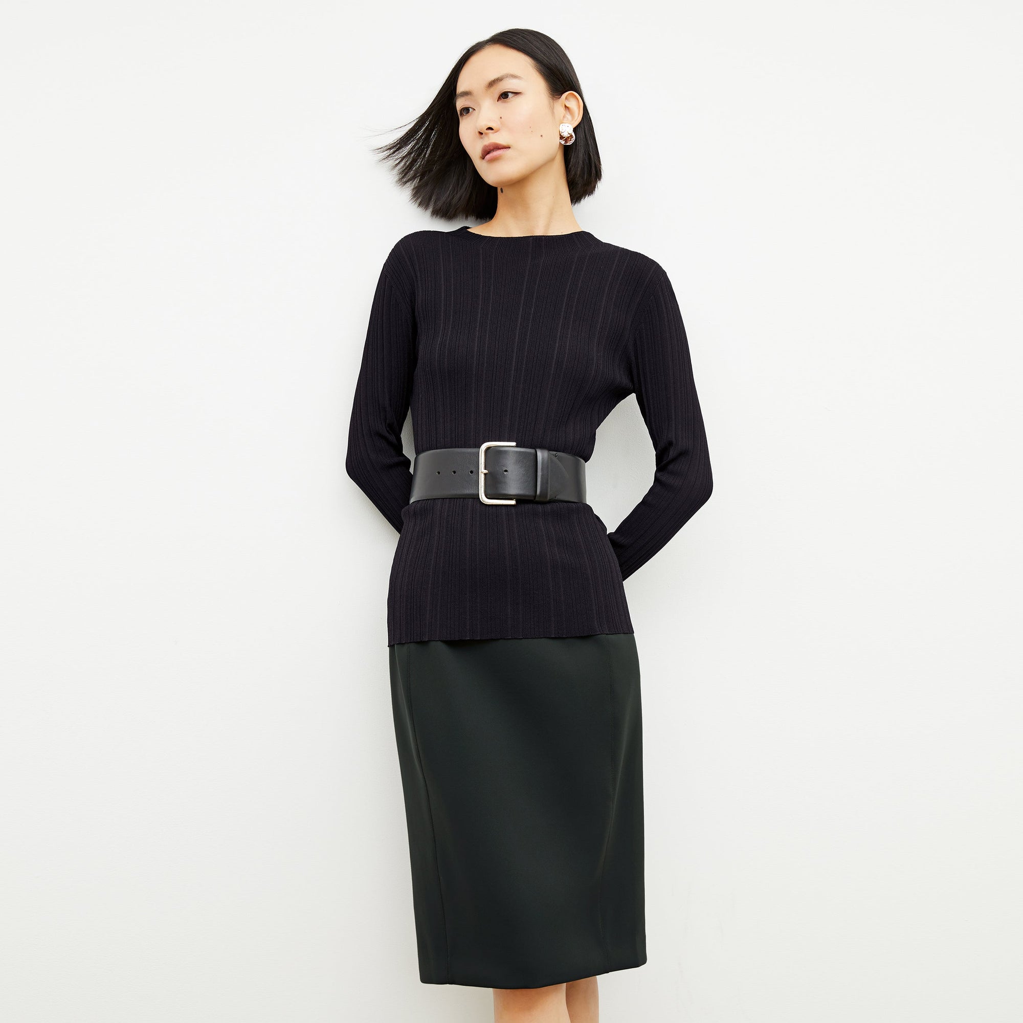 Image of a woman wearing the Chantal Skirt - Light Scuba in Forest