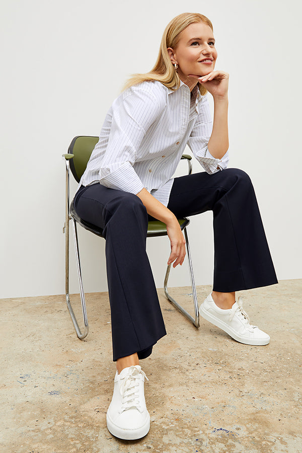 Front image of a woman wearing the Mila Button Down - Poplin Stripe in Blue / Ivory | Exclude