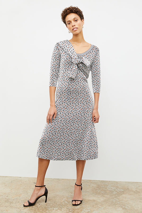 Front image of a woman wearing the Tippy Dress in Brick and Black | Exclude