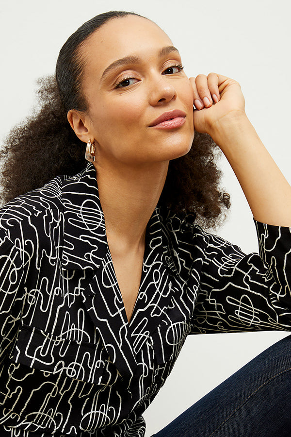 front image of a woman wearing the alyssa jacket in symphony print | Exclude | Grid Hover