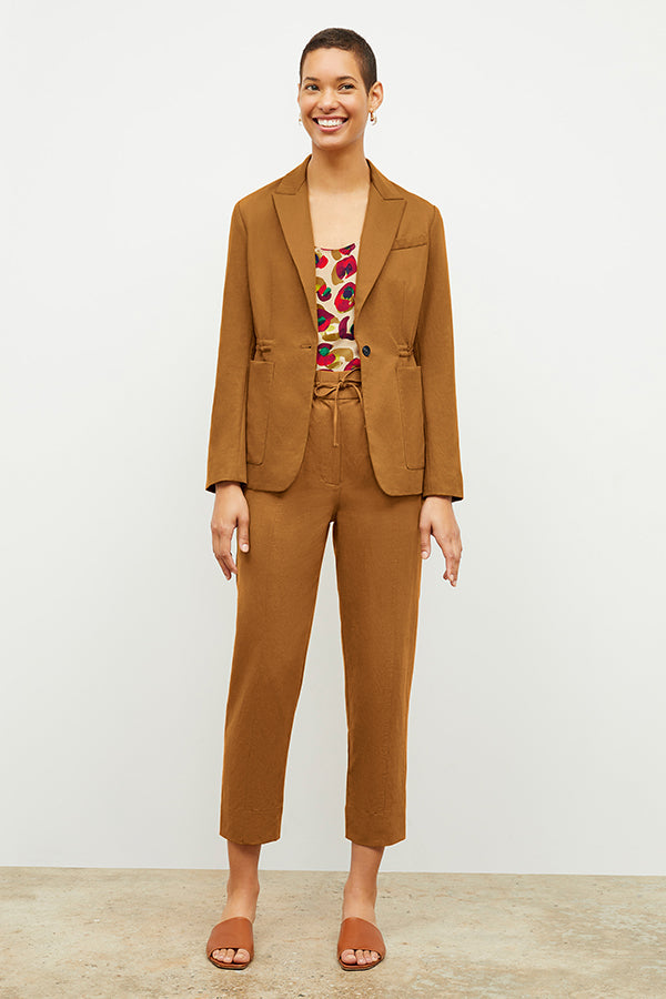 Front image of a woman wearing the Shane Pant in Acorn | Exclude 