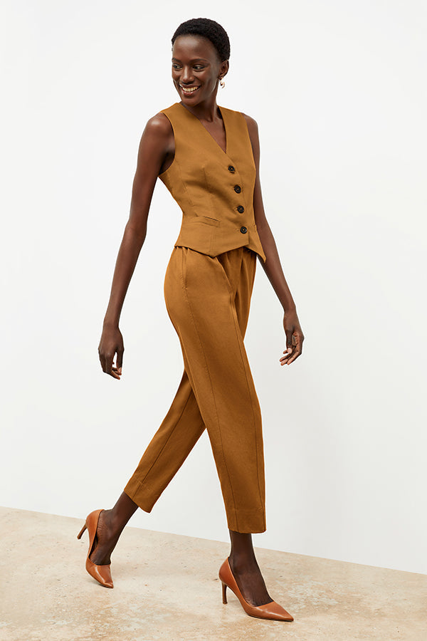 Front image of a woman wearing the Shane Pant in Acorn | Exclude 