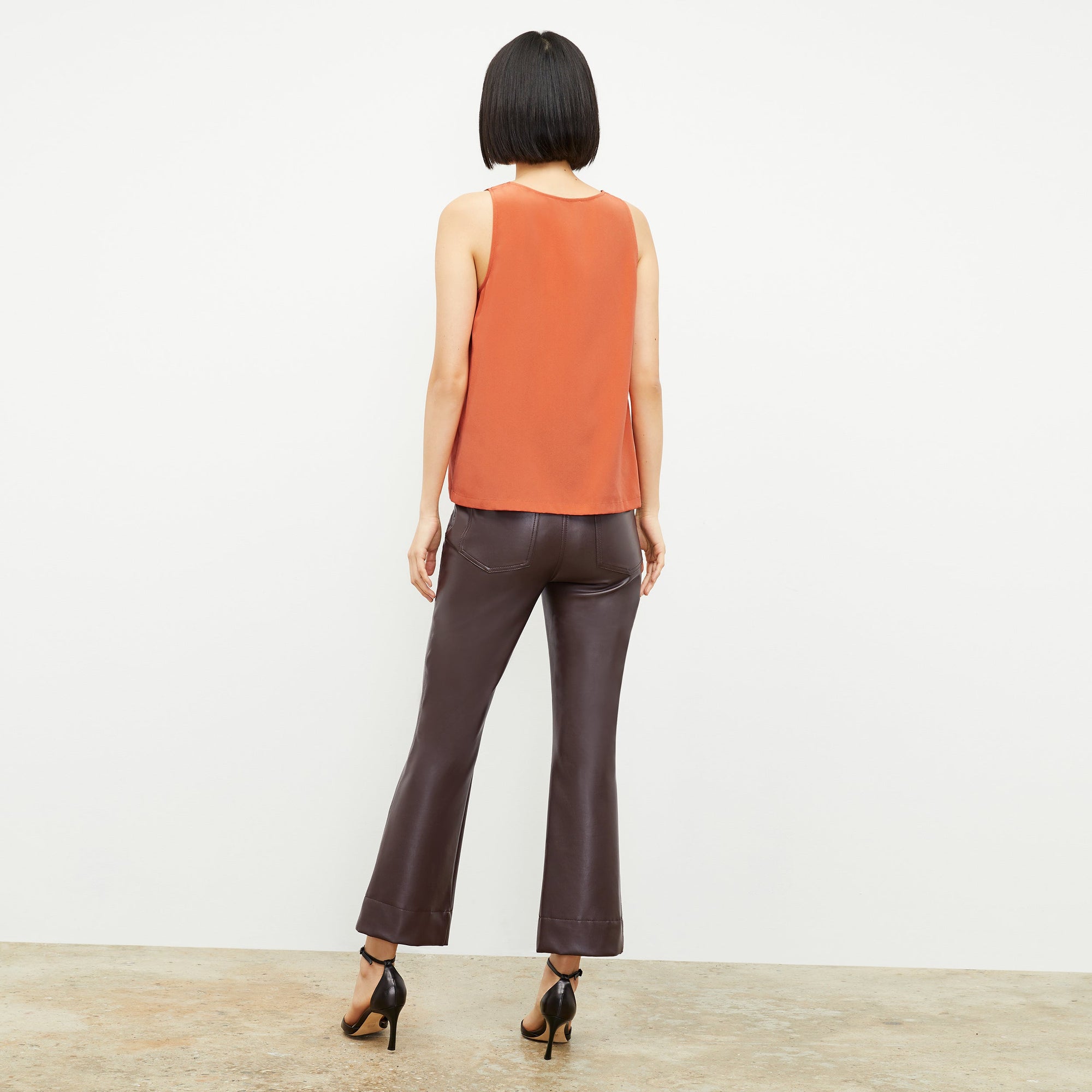 Front image of a woman wearing the archie pant in brown | Exclude