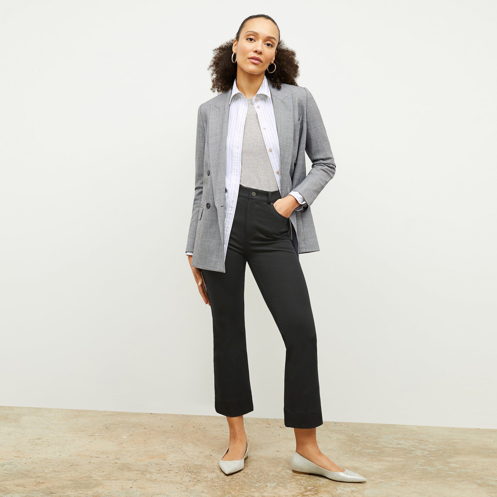 Front image of a woman wearing the Mila Button Down - Poplin Stripe in Blue / Ivory | Exclude