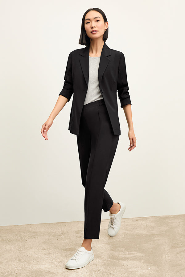Front image of a woman standing wearing the Colby Jogger in Black | Exclude