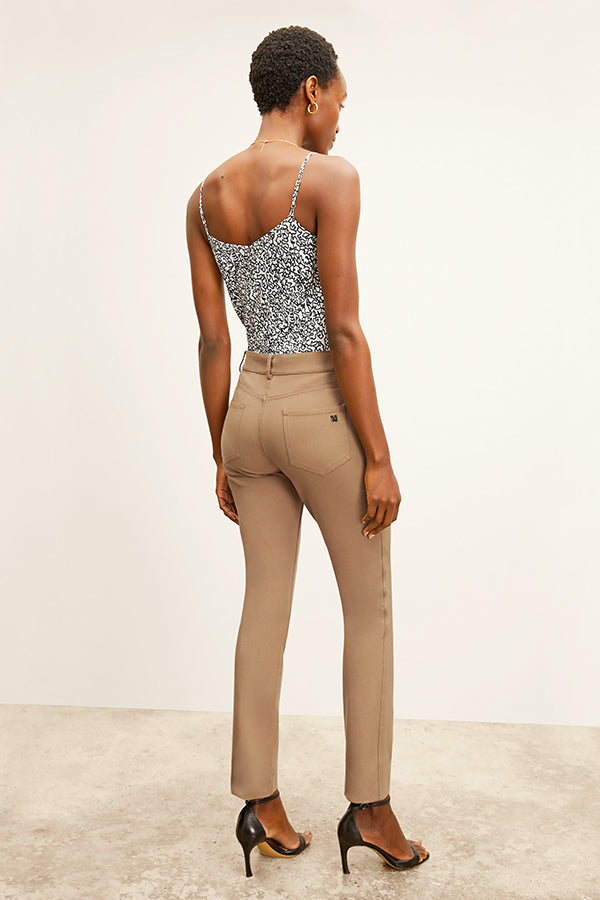 front image of a woman wearing the roma jean in saddle | Exclude