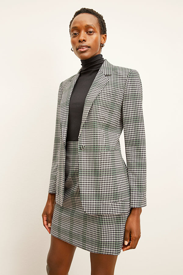 front image of a woman wearing the whitney skirt in check plaid | Exclude | Grid Hover