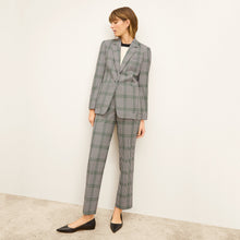 front image of a woman wearing the smith pant in check plaid