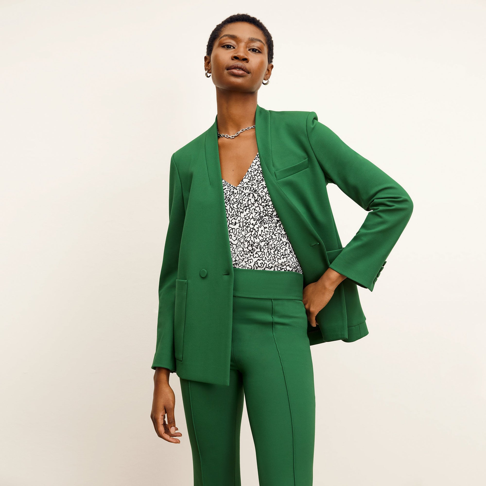 front image of a woman wearing the janette jacket in shamrock | Lead