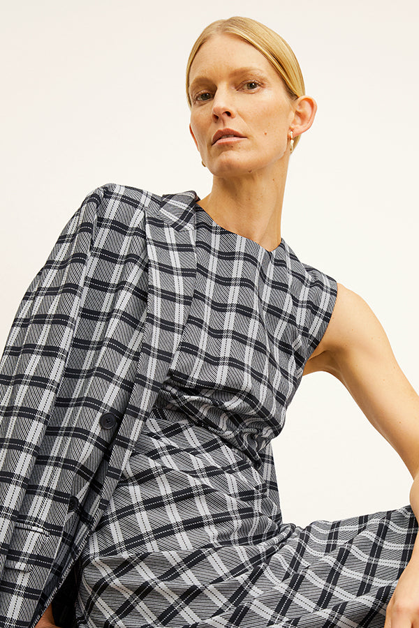 front image of a woman wearing the jeannine dress in checkmate | Exclude 
