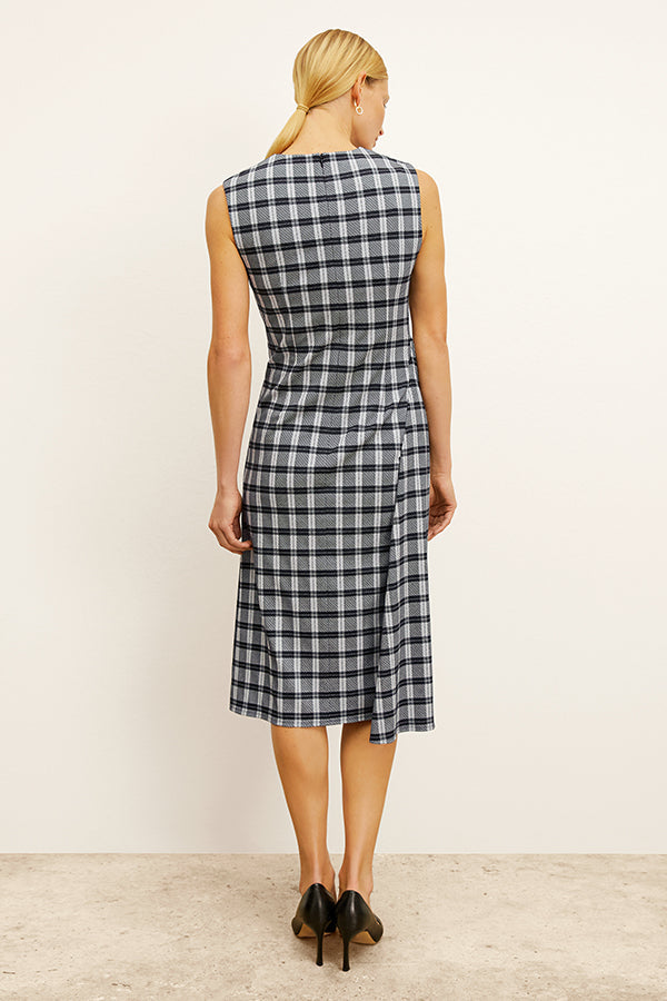 front image of a woman wearing the jeannine dress in checkmate | Exclude 