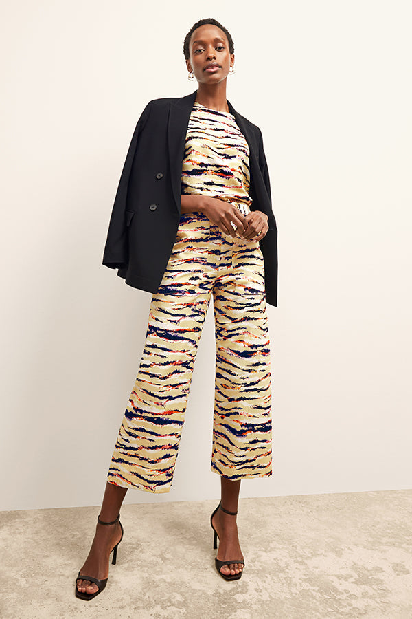 front image of a woman wearing the madelyn pant in savannah print | Exclude | Grid Hover