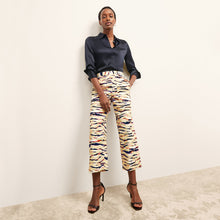 front image of a woman wearing the madelyn pant in savannah print | Lead