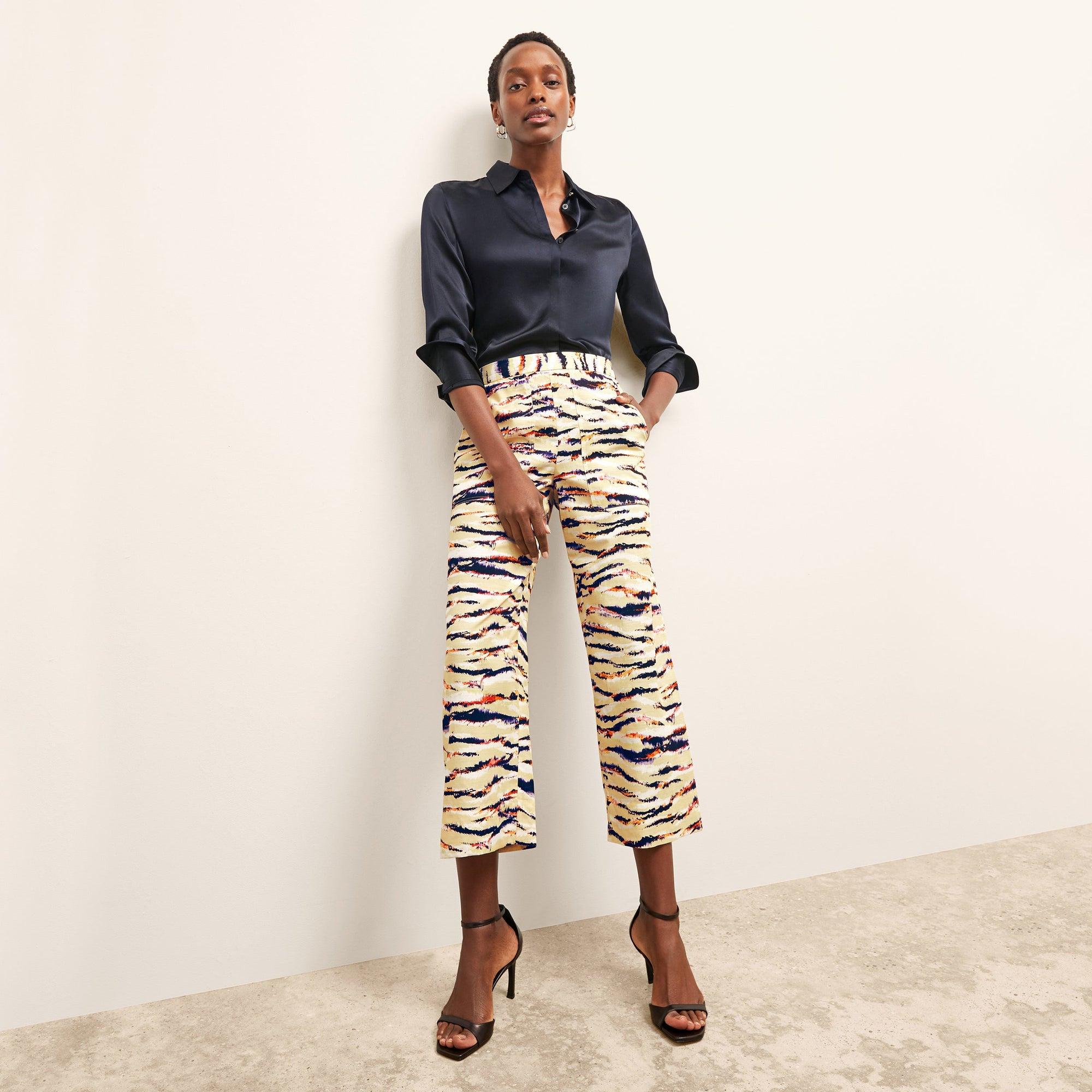 front image of a woman wearing the madelyn pant in savannah print | Lead