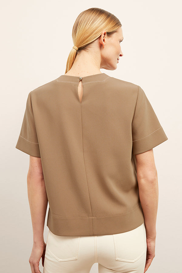 front image of a woman wearing the annika top in saddle | Exclude