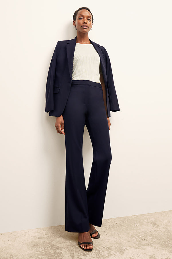 front image of a woman wearing the charlie top in ivory | Exclude