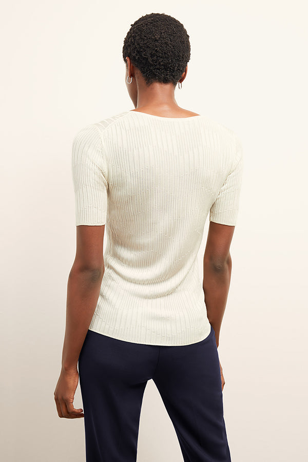 back image of a woman wearing the charlie top in ivory | Exclude