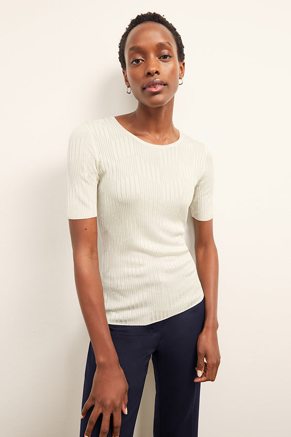 front image of a woman wearing the charlie top in ivory | Exclude | Grid