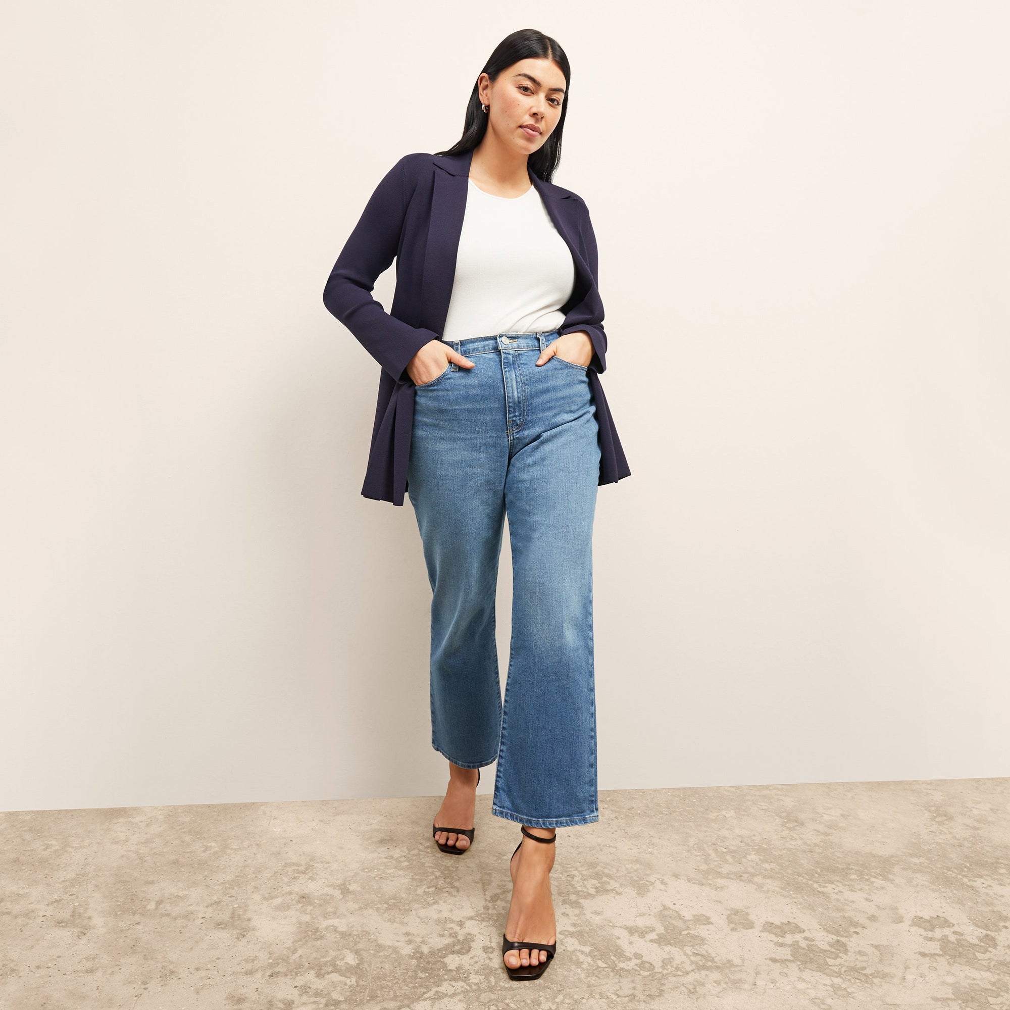 Front image of a woman wearing the Merritt Jardigan in Navy