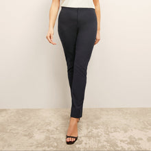Front image of a woman standing wearing the Hockley pant in ink | Lead