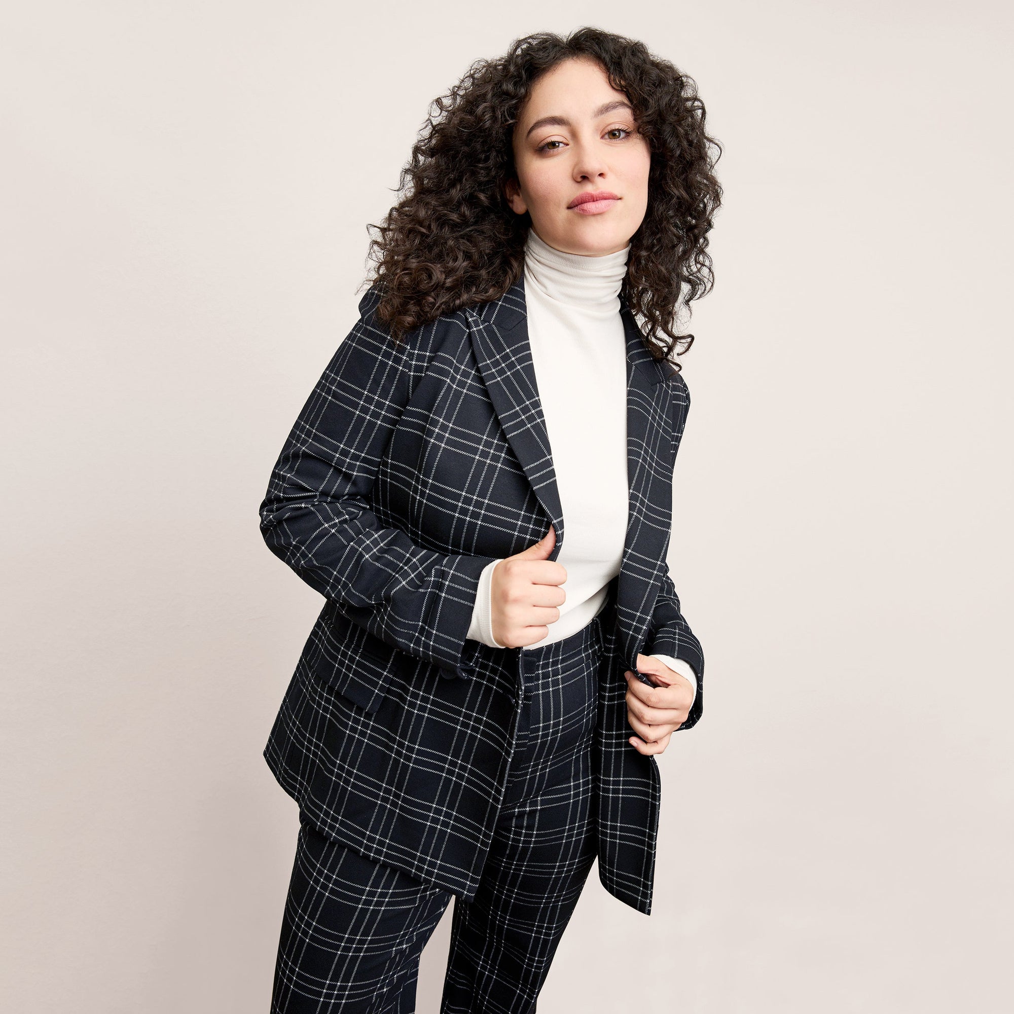 front image of a woman wearing the o'hara blazer in black/white | Exclude