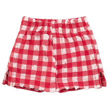 Red and white gingham check swim trunk with elastic waistband and side ruching detail.