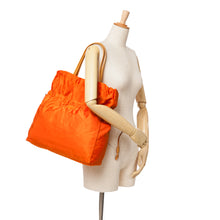 Prada | Pre-Owned Tessuto Logo Drawstring Tote | Orange