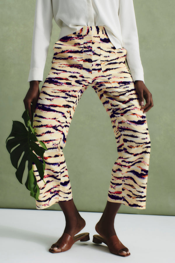 front image of a woman wearing the madelyn pant in savannah print | Exclude
