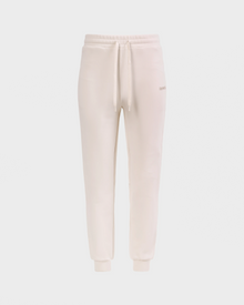 The Rudsak MAXTON - U525007 Vanilla M jogger sweatpants feature a beige cotton blend, elastic waistband with drawstring, side pockets, and cuffed ankles for everyday comfort, shown against a white background.