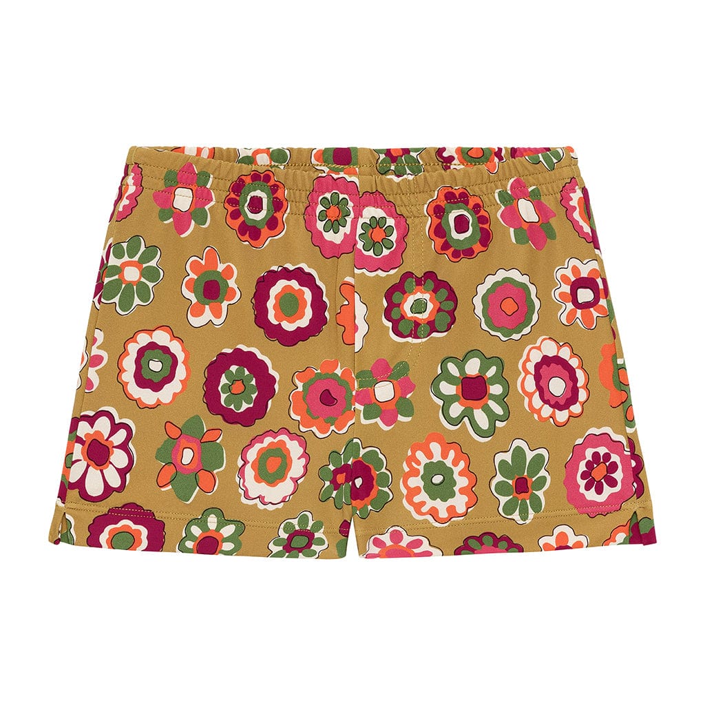 Tan swim trunk with multicolored floral print featuring pink, red, green, and white flowers throughout.
