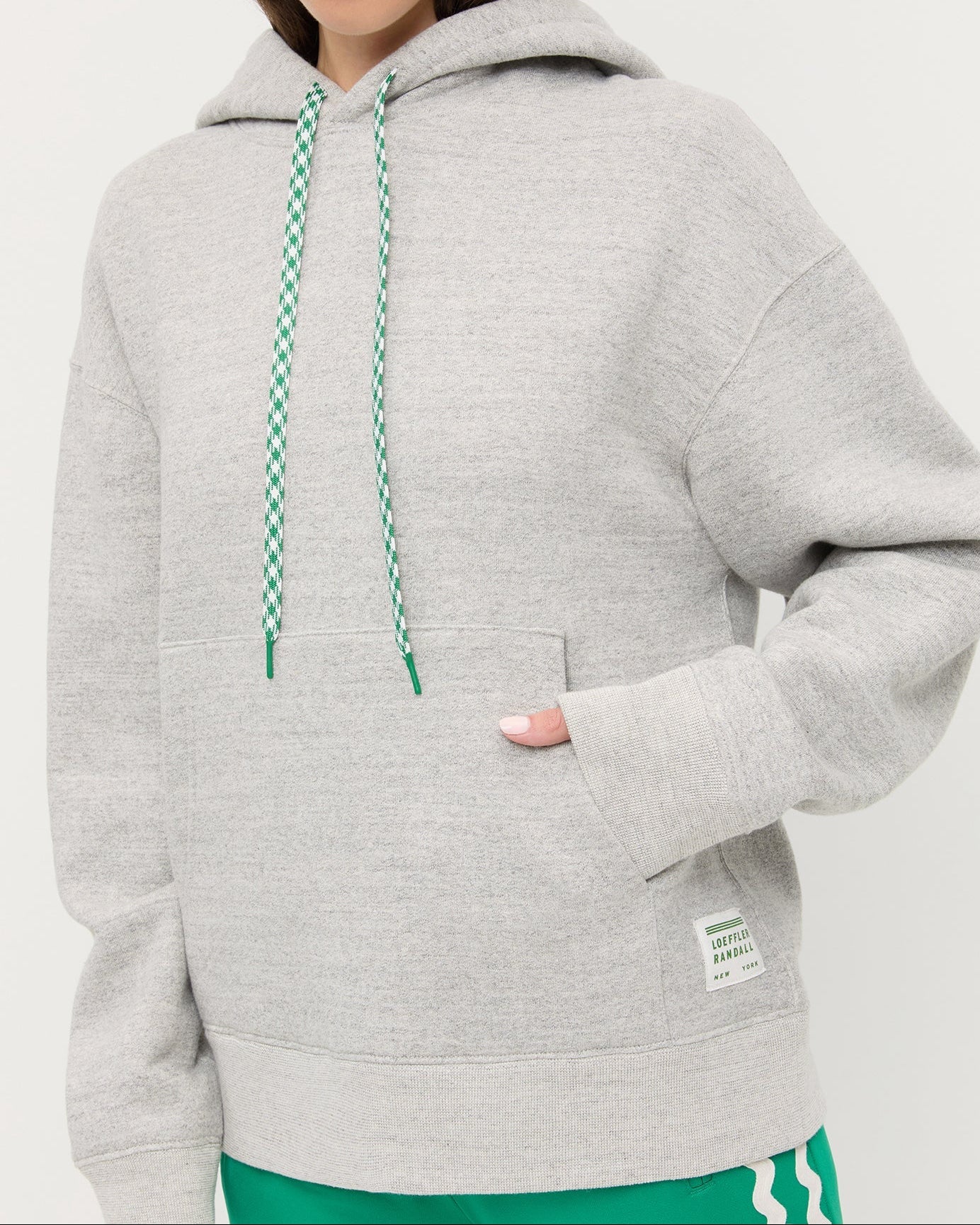 Nova Hoodie in grey cotton and Venus Track Pant in green cotton.