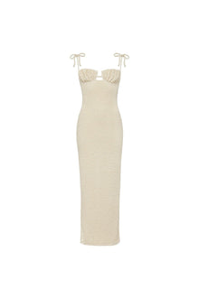 Beige textured long slip dress with sweetheart neckline and tie shoulder straps.