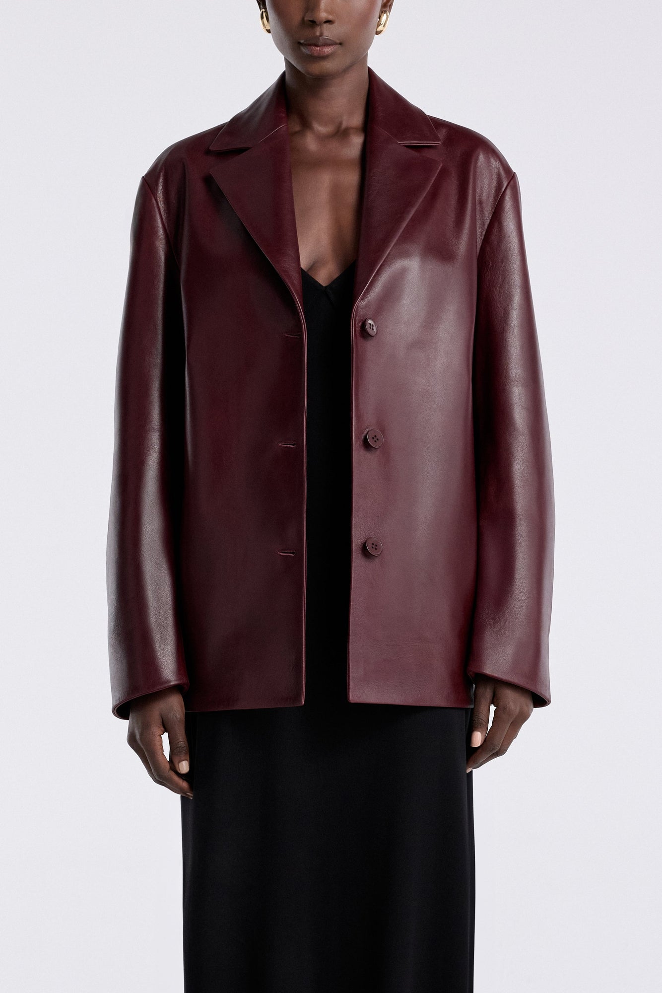 Model is wearing the Nour Hammour Opus Relaxed Leather Blazer Mure - Front Open