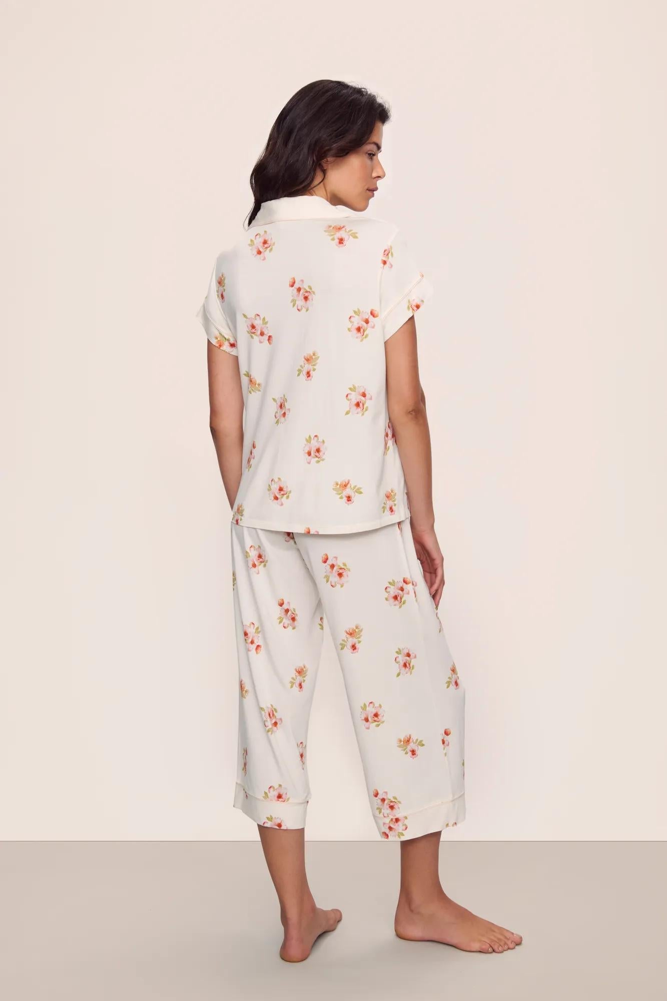 Model is wearing Gisele Printed TENCEL Modal Short Sleeve Cropped PJ Set in  Floral Bloom Ivy/Vanilla Cream