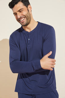 Model wears Henry TENCEL™ Modal Long Sleeve Henley in true navy.