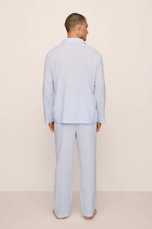 Model is wearing Men's Nautico Long PJ Set in White/CornflowerBlue