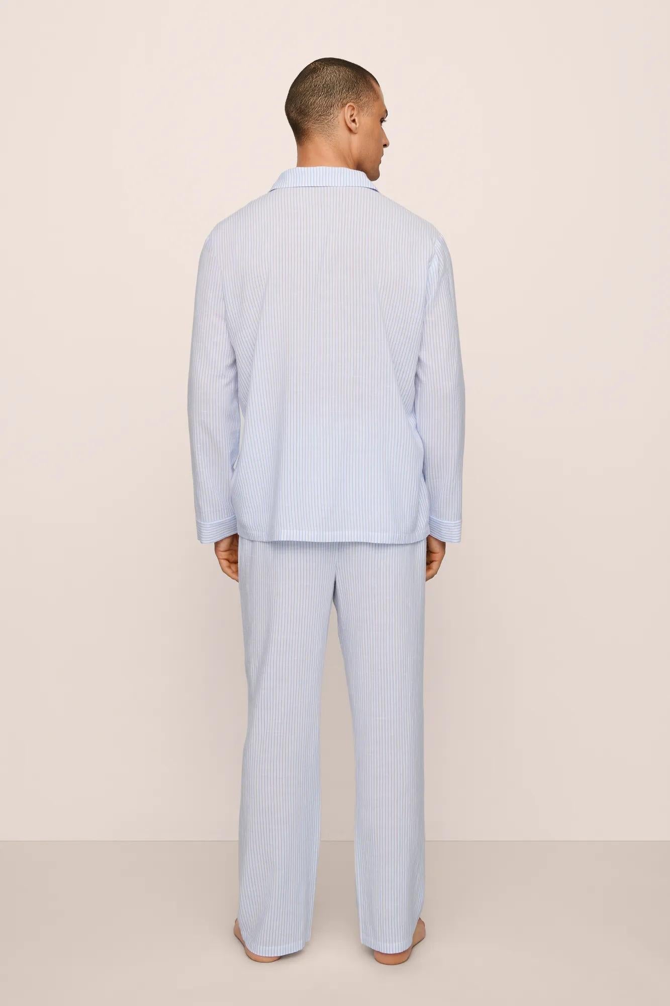 Model is wearing Men's Nautico Long PJ Set in White/CornflowerBlue