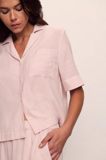 Model is wearing Nautico Relaxed Short Sleeve & Pant PJ Set in  Feeder Stripes Pale Mauve/White