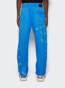 Men | Amiri | Pigment Spray Star Sweatpants | Heather Carolina Blue