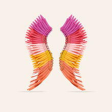 Pink, Yellow, and Orange Sequin Wing Earrings on Tan Background