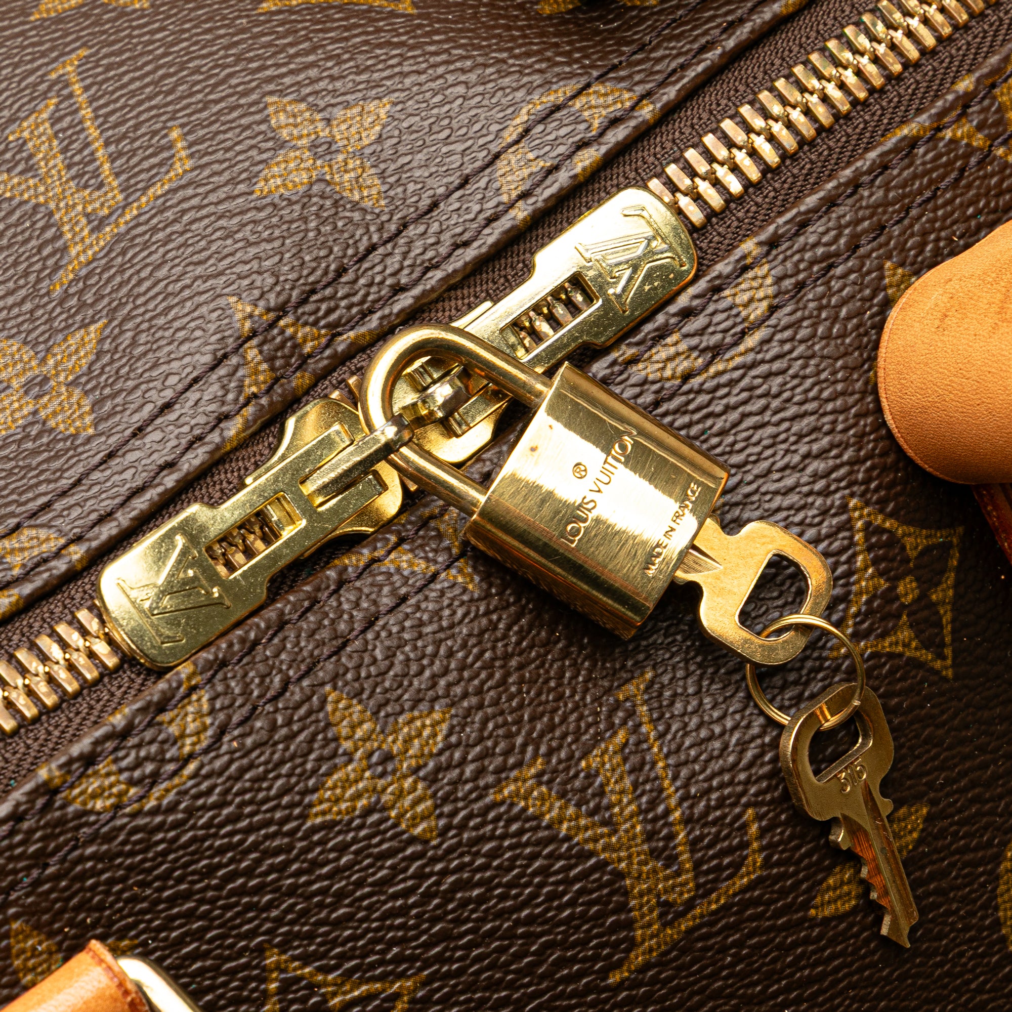 Louis Vuitton | Pre-Owned Monogram Keepall 55 | Brown