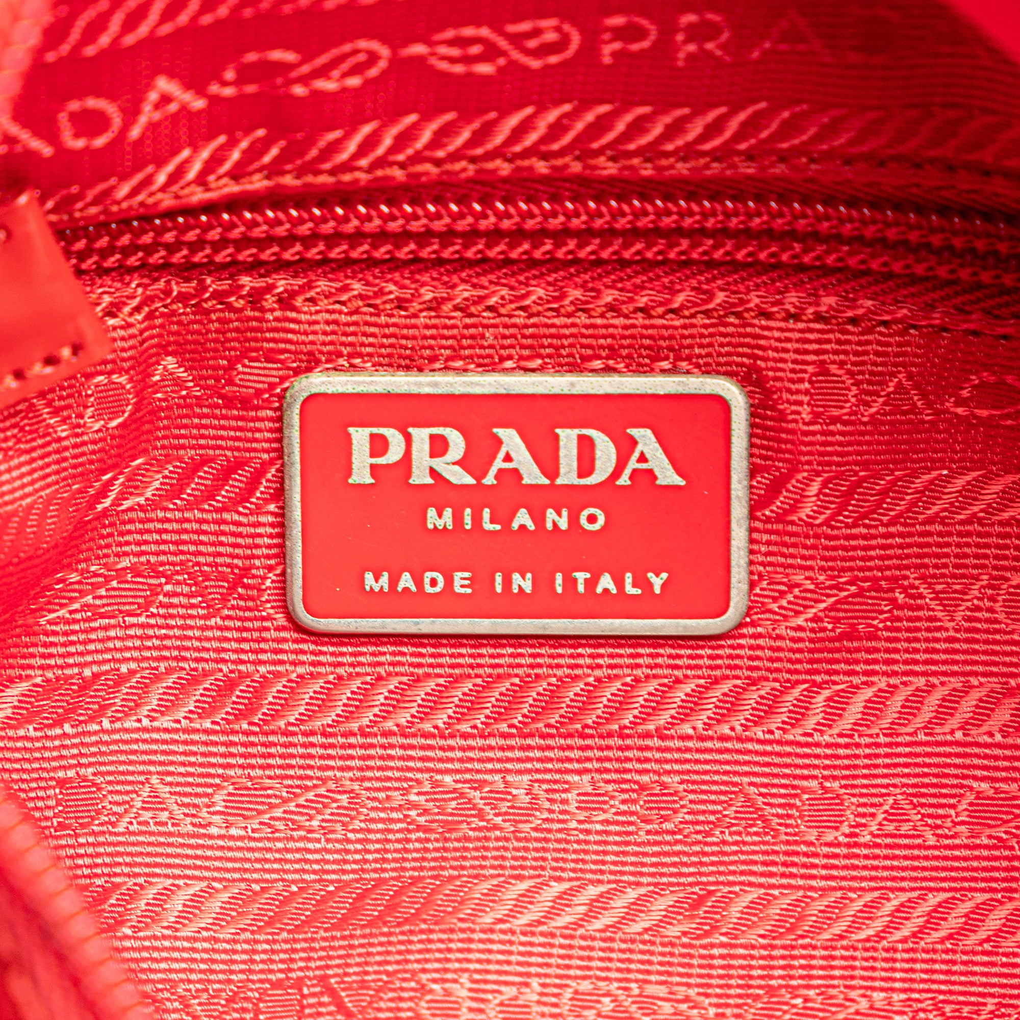Prada | Pre-Owned Tessuto Zip Buckle Messenger Bag | Red