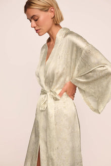Model is wearing Inez Washable Silk Printed Robe in Foliage Mint Cream